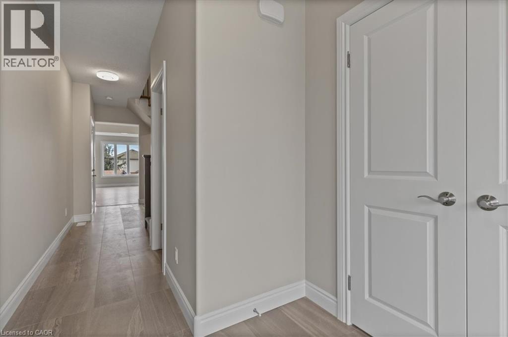Hallway with baseboards - 256 Keeso Lane, Listowel, ON - Indoor Photo Showing Other Room