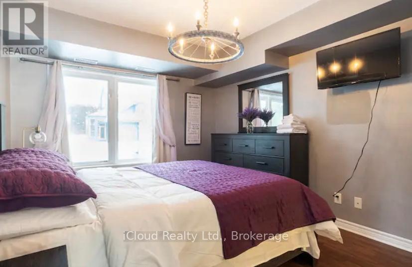 104 - 1 Brandy Lane Drive, Collingwood, ON - Indoor Photo Showing Bedroom