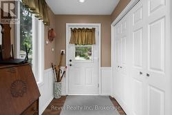 walkout to covered porch and backyard -