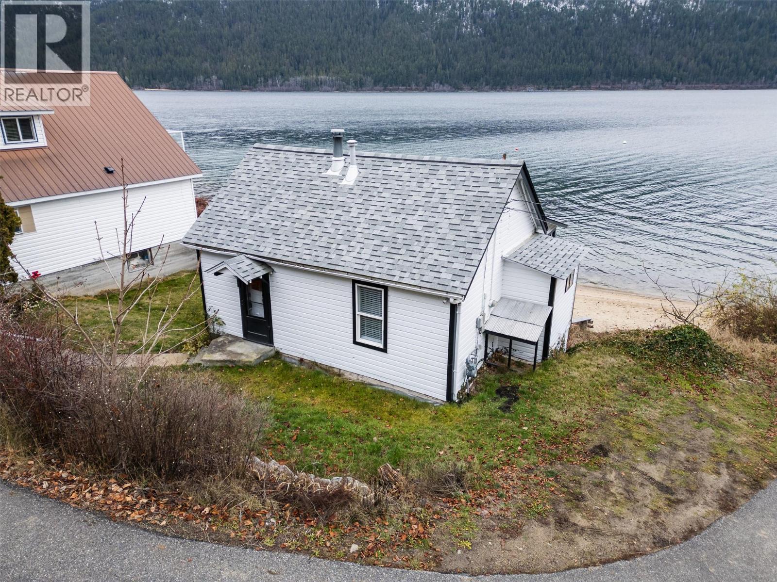 3230 3A Highway, Nelson, BC - Outdoor With Body Of Water