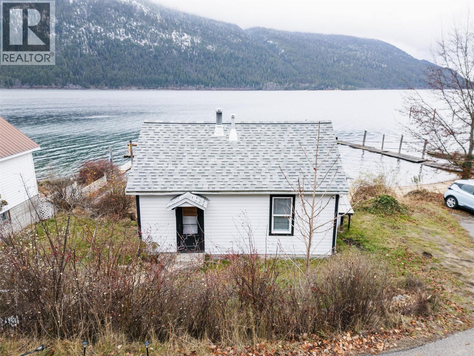 3230 3A Highway, Nelson, BC - Outdoor With Body Of Water