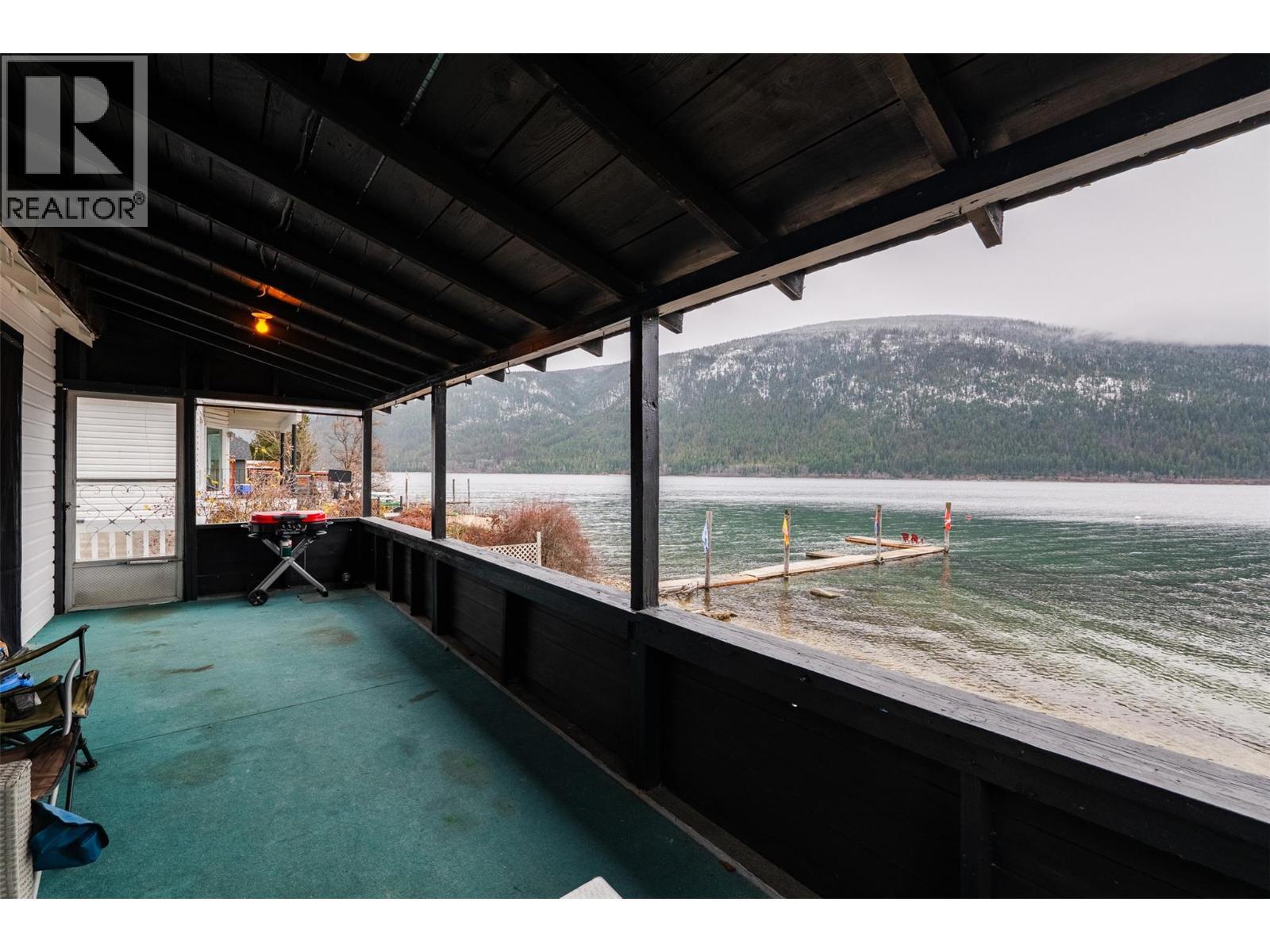 3230 3A Highway, Nelson, BC - Outdoor With Body Of Water With Deck Patio Veranda With Exterior