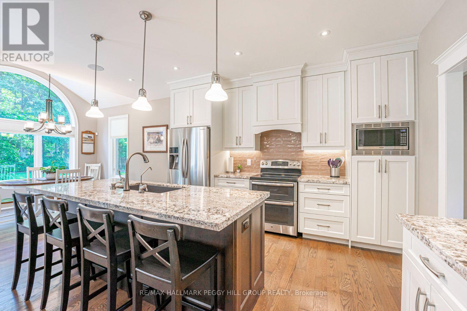 126 Mennill Drive, Springwater, ON - Indoor Photo Showing Kitchen With Stainless Steel Kitchen With Upgraded Kitchen