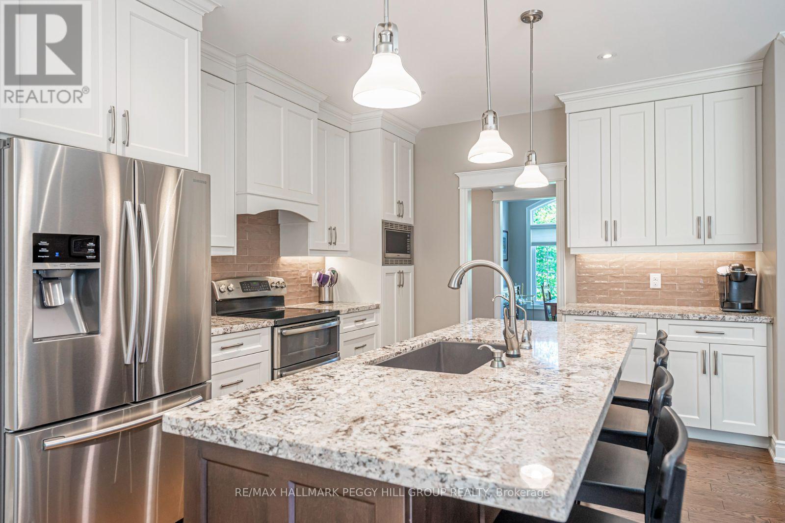 126 Mennill Drive, Springwater, ON - Indoor Photo Showing Kitchen With Stainless Steel Kitchen With Upgraded Kitchen