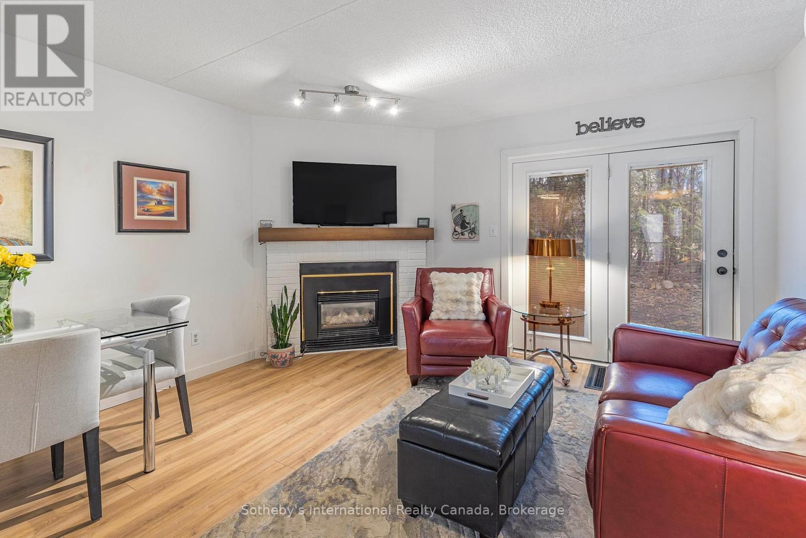 181 - 49 Trott Boulevard, Collingwood, ON - Indoor Photo Showing Living Room With Fireplace