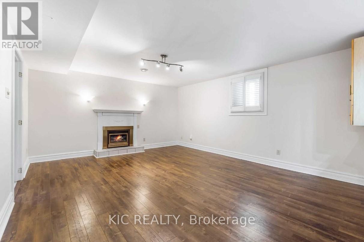 Basement - 912 Tegal Place, Newmarket, ON - Indoor Photo Showing Other Room With Fireplace