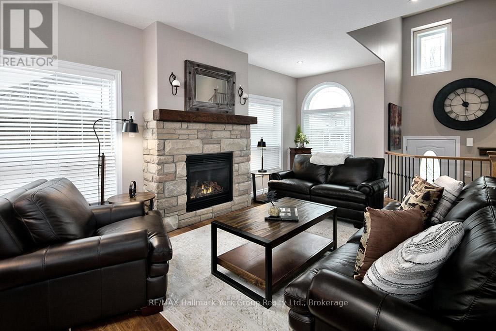 34 Davis Street, Collingwood, ON - Indoor Photo Showing Living Room With Fireplace