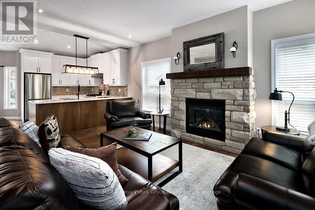 34 Davis Street, Collingwood, ON - Indoor Photo Showing Living Room With Fireplace