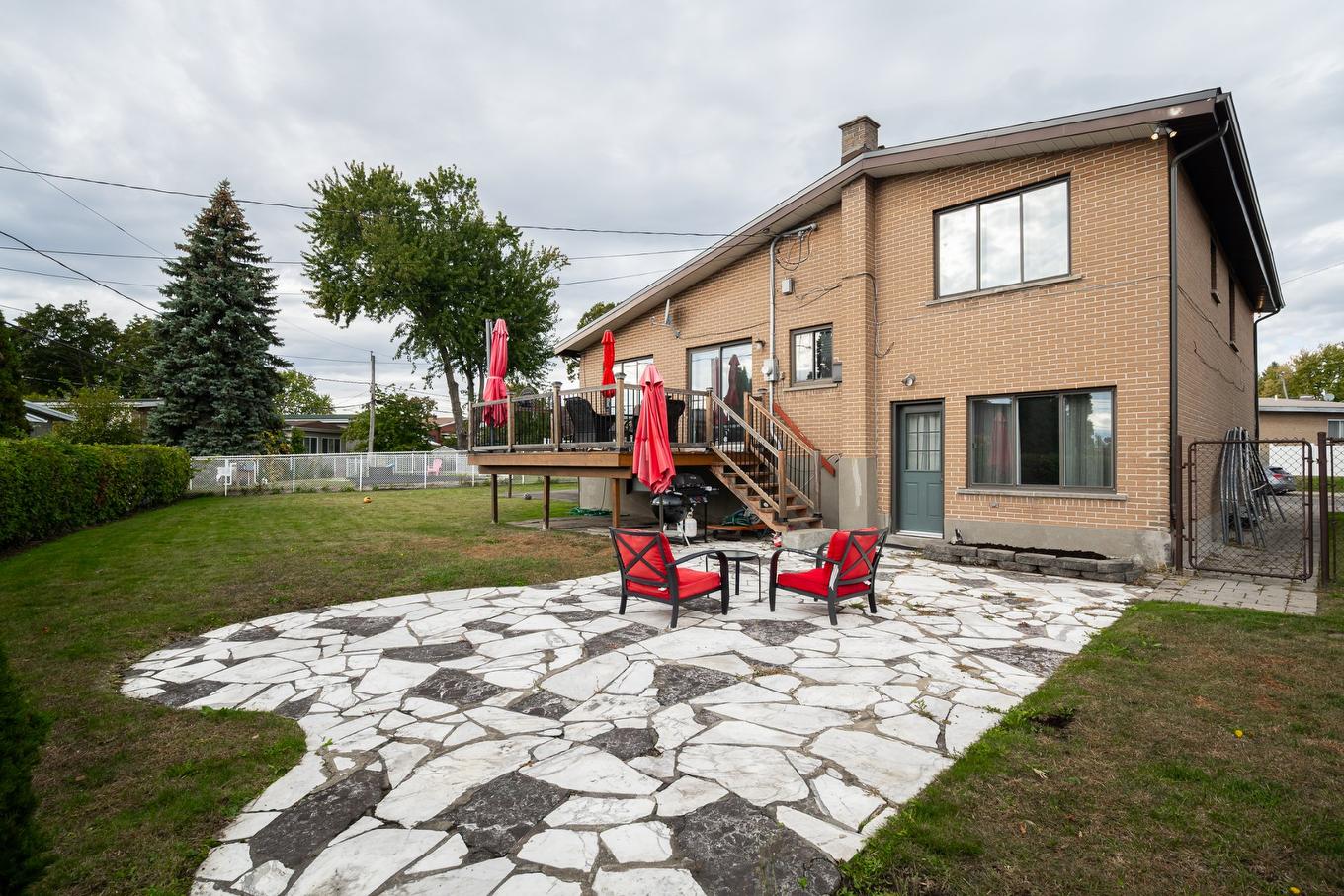 Back facade - 1438 Rue Franklin, Laval (Chomedey), QC - Outdoor With Deck Patio Veranda
