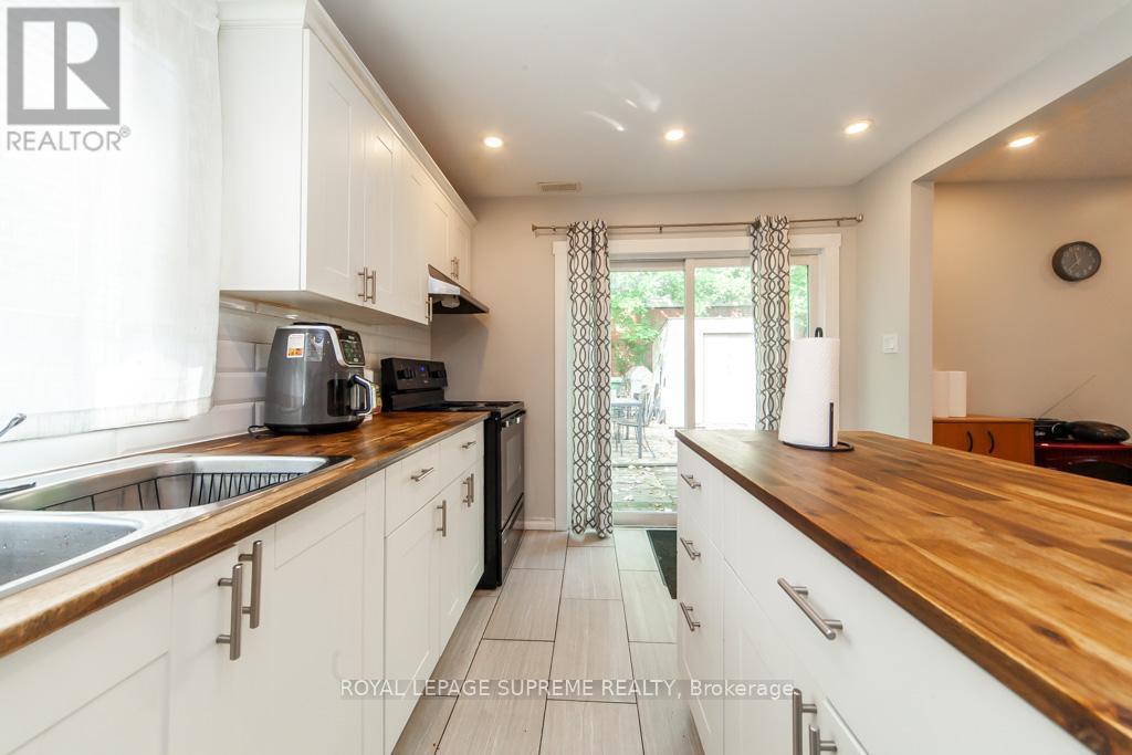 13 Robins Avenue, Hamilton, ON - Indoor Photo Showing Kitchen With Double Sink