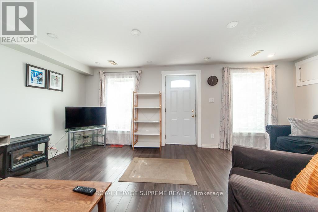 13 Robins Avenue, Hamilton, ON - Indoor Photo Showing Living Room With Fireplace