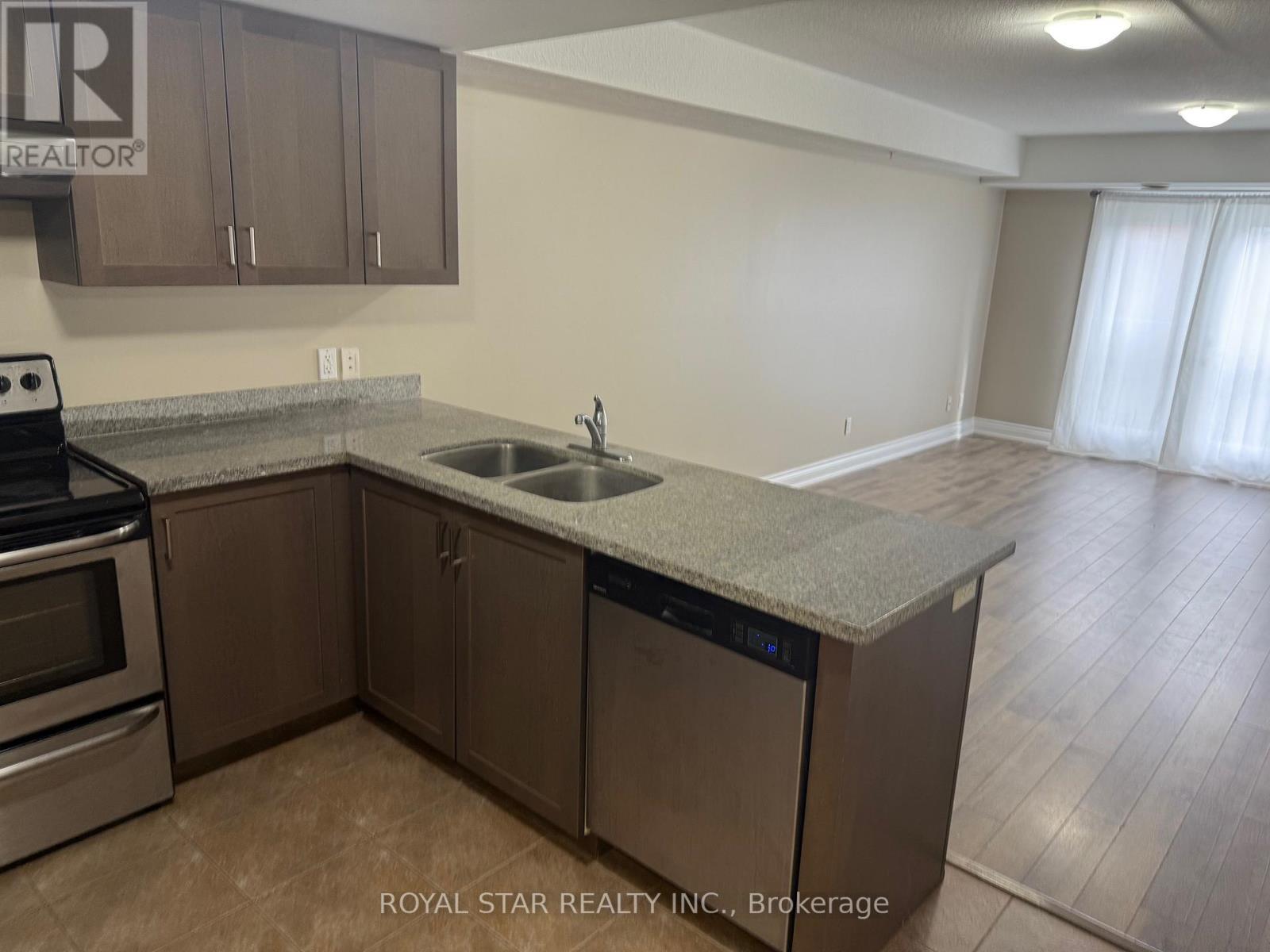 301 - 64 Frederick Drive, Guelph, ON - Indoor Photo Showing Kitchen With Double Sink