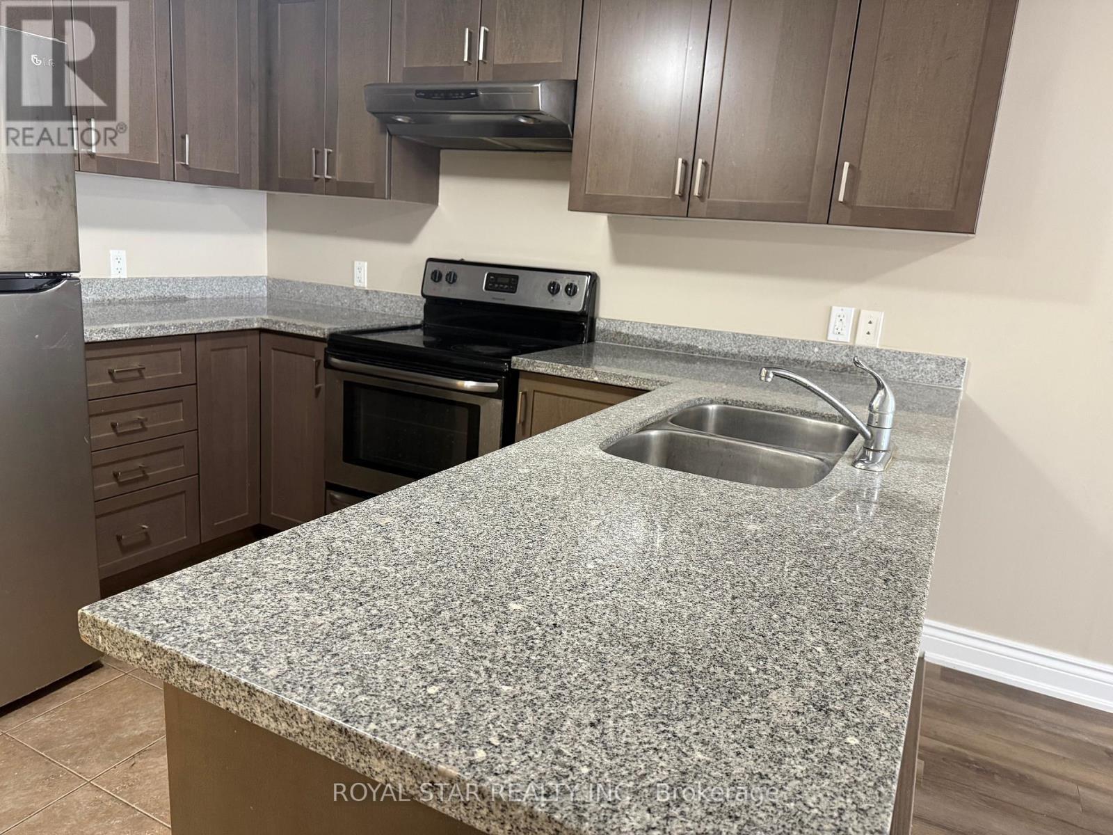 301 - 64 Frederick Drive, Guelph, ON - Indoor Photo Showing Kitchen With Double Sink