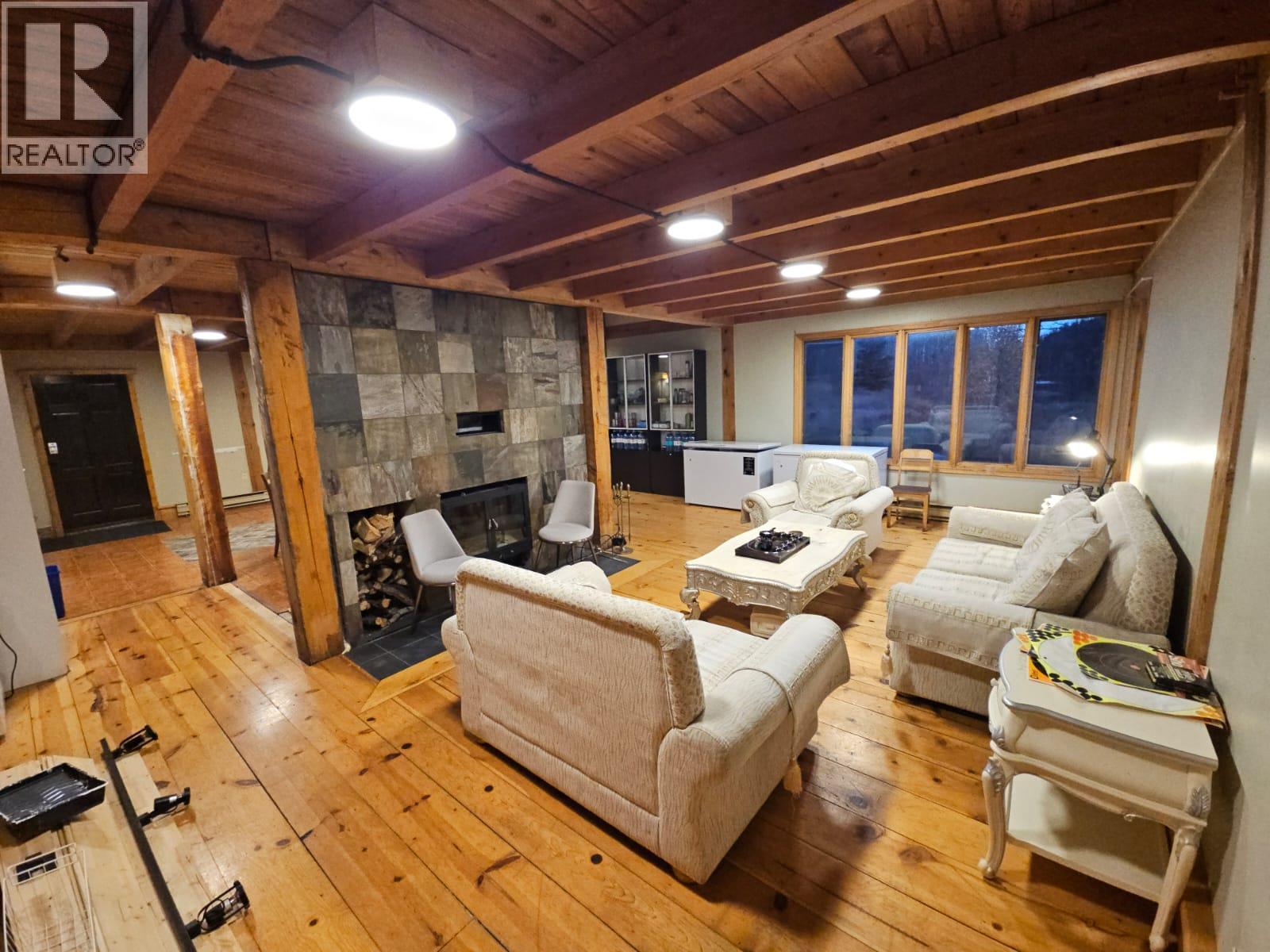 2601 Calliou Road, Chetwynd, BC - Indoor With Fireplace
