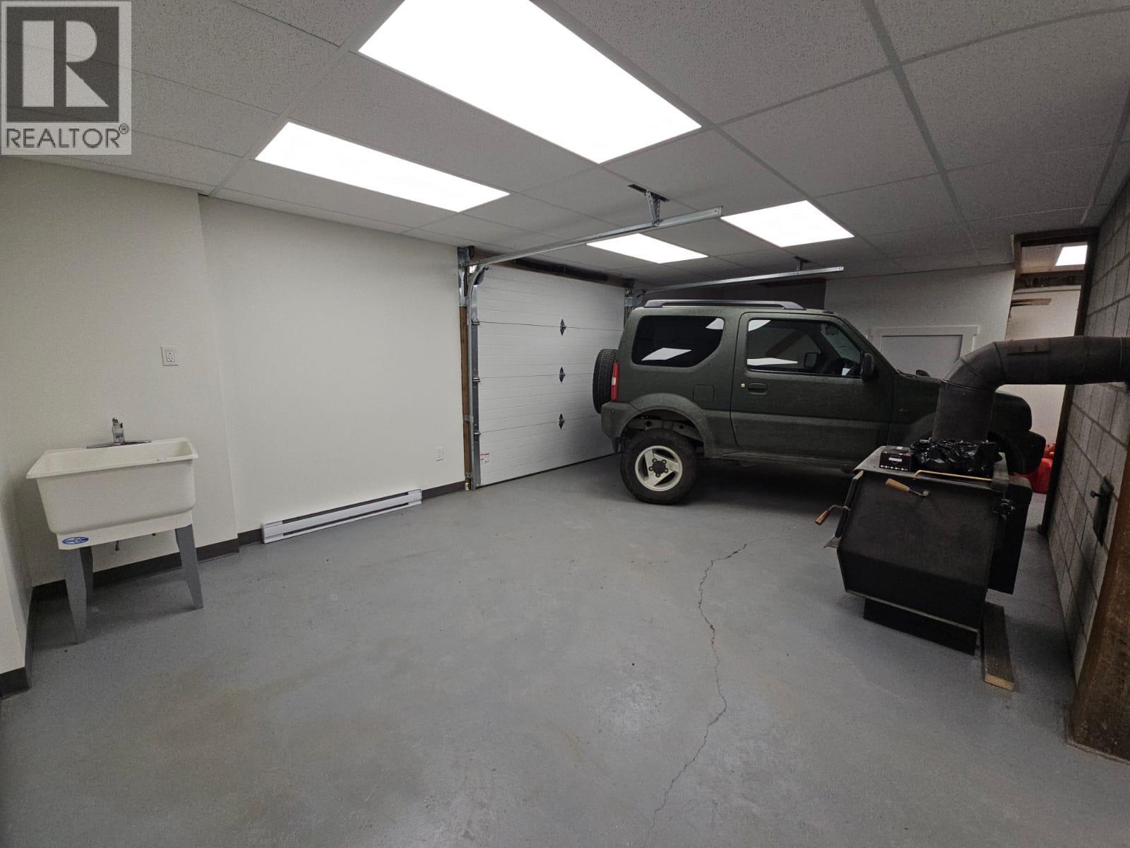 2601 Calliou Road, Chetwynd, BC - Indoor Photo Showing Garage