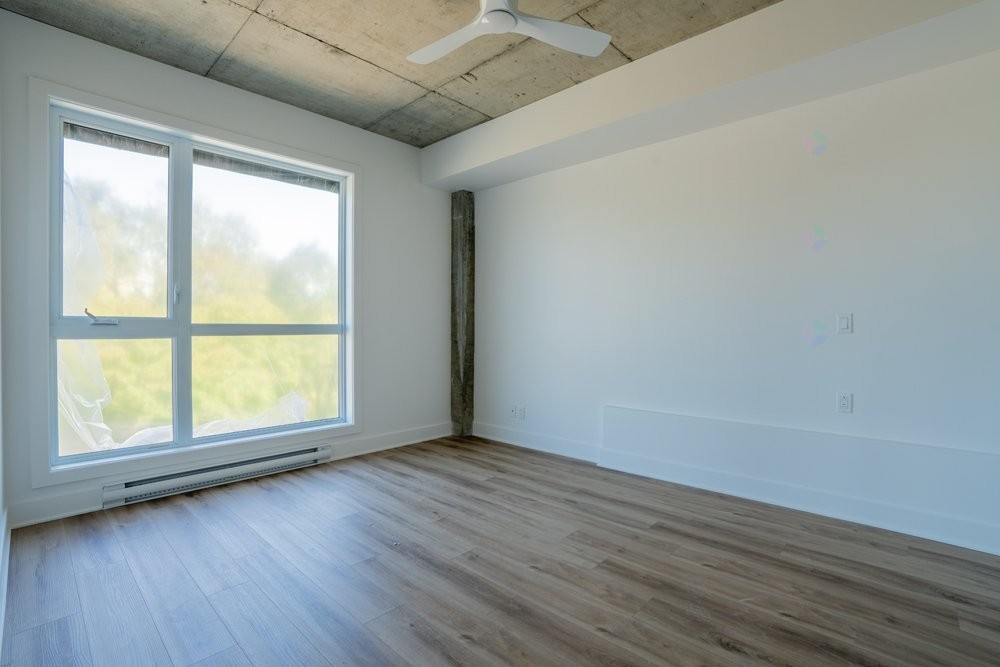 Living Room - 102-8945 Boul. Viau, Montréal (Saint-Léonard), QC - Indoor Photo Showing Other Room