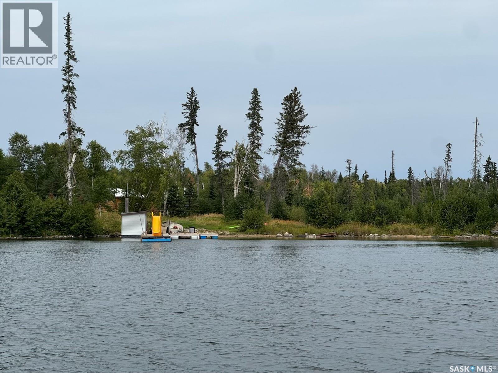 Cabin On Island Near Mooney Beach, Lac La Ronge Provincial Park, SK - Outdoor With Body Of Water With View