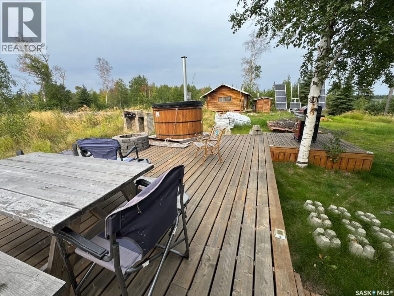 Cabin On Island Near Mooney Beach, Lac La Ronge Provincial Park, SK - Outdoor With Deck Patio Veranda