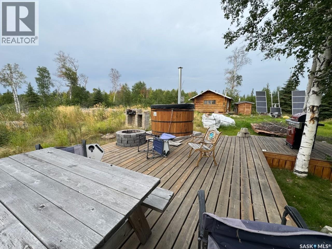 Cabin On Island Near Mooney Beach, Lac La Ronge Provincial Park, SK - Outdoor With Deck Patio Veranda