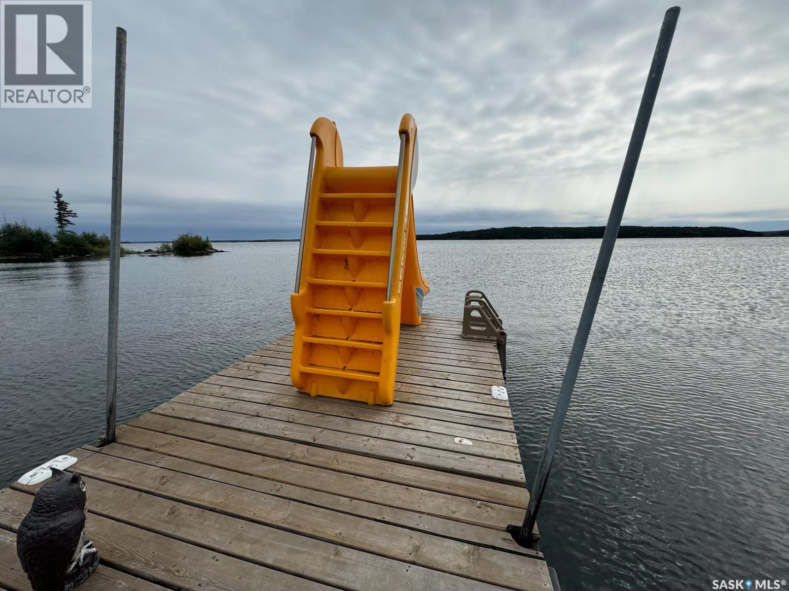 Cabin On Island Near Mooney Beach, Lac La Ronge Provincial Park, SK - Outdoor With Body Of Water With View