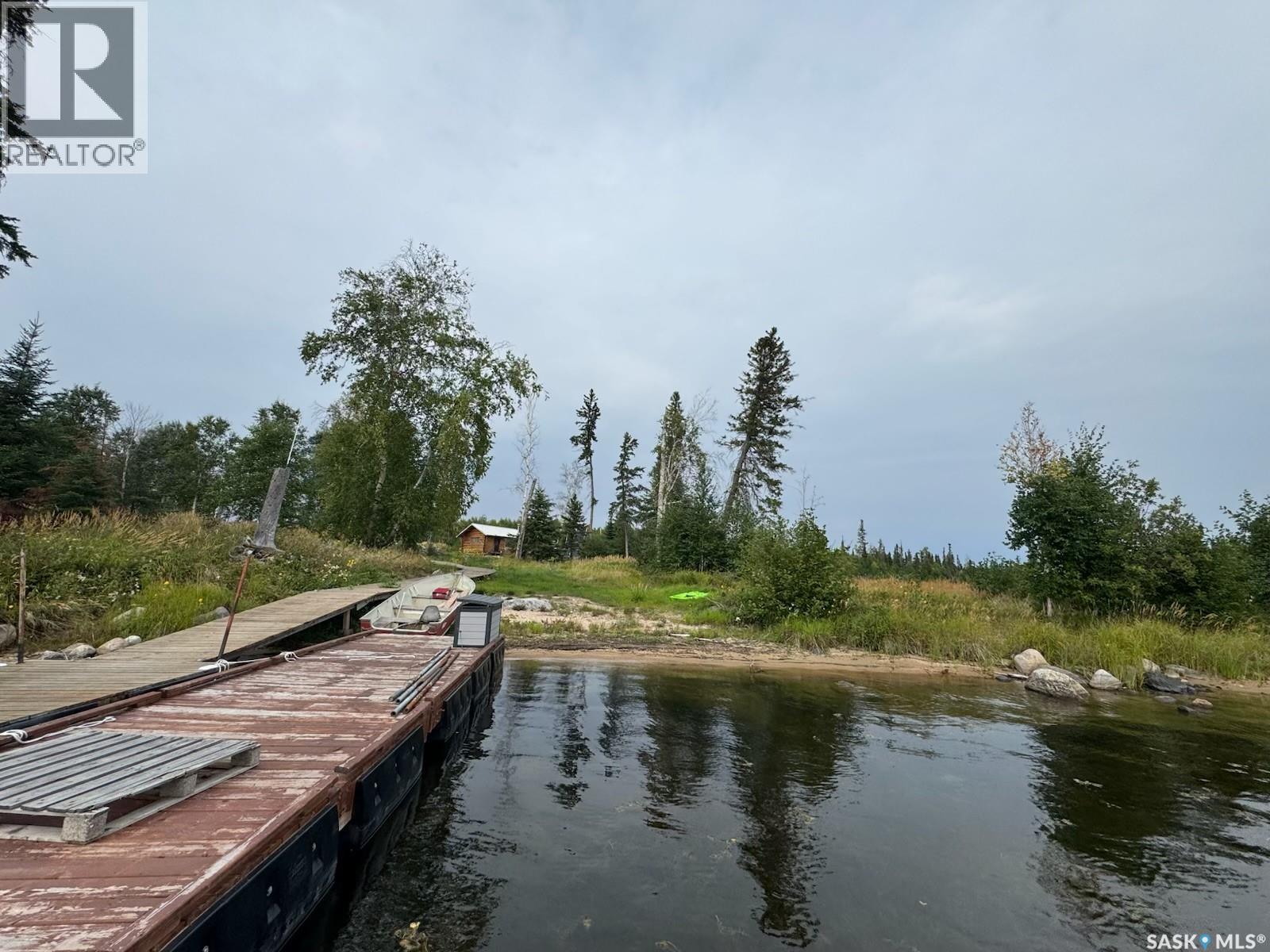 Cabin On Island Near Mooney Beach, Lac La Ronge Provincial Park, SK - Outdoor With Body Of Water With View