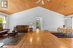 Vaulted Great Room with living & dining room areas -