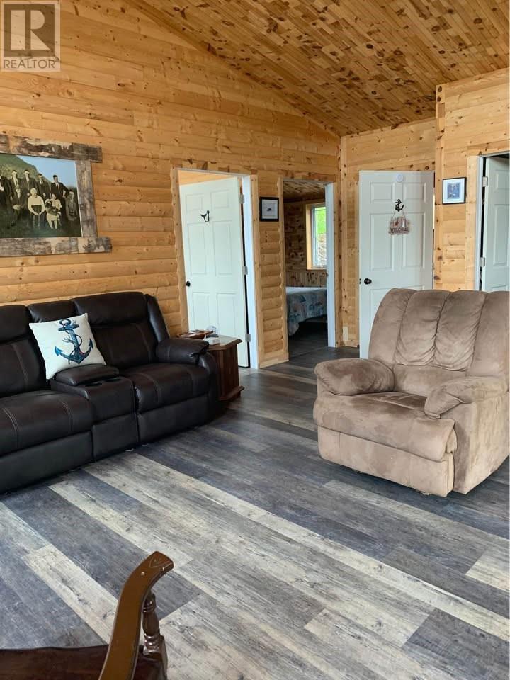 1 Julie'S Harbour Other, Badger Bay, NL - Indoor Photo Showing Living Room With Fireplace