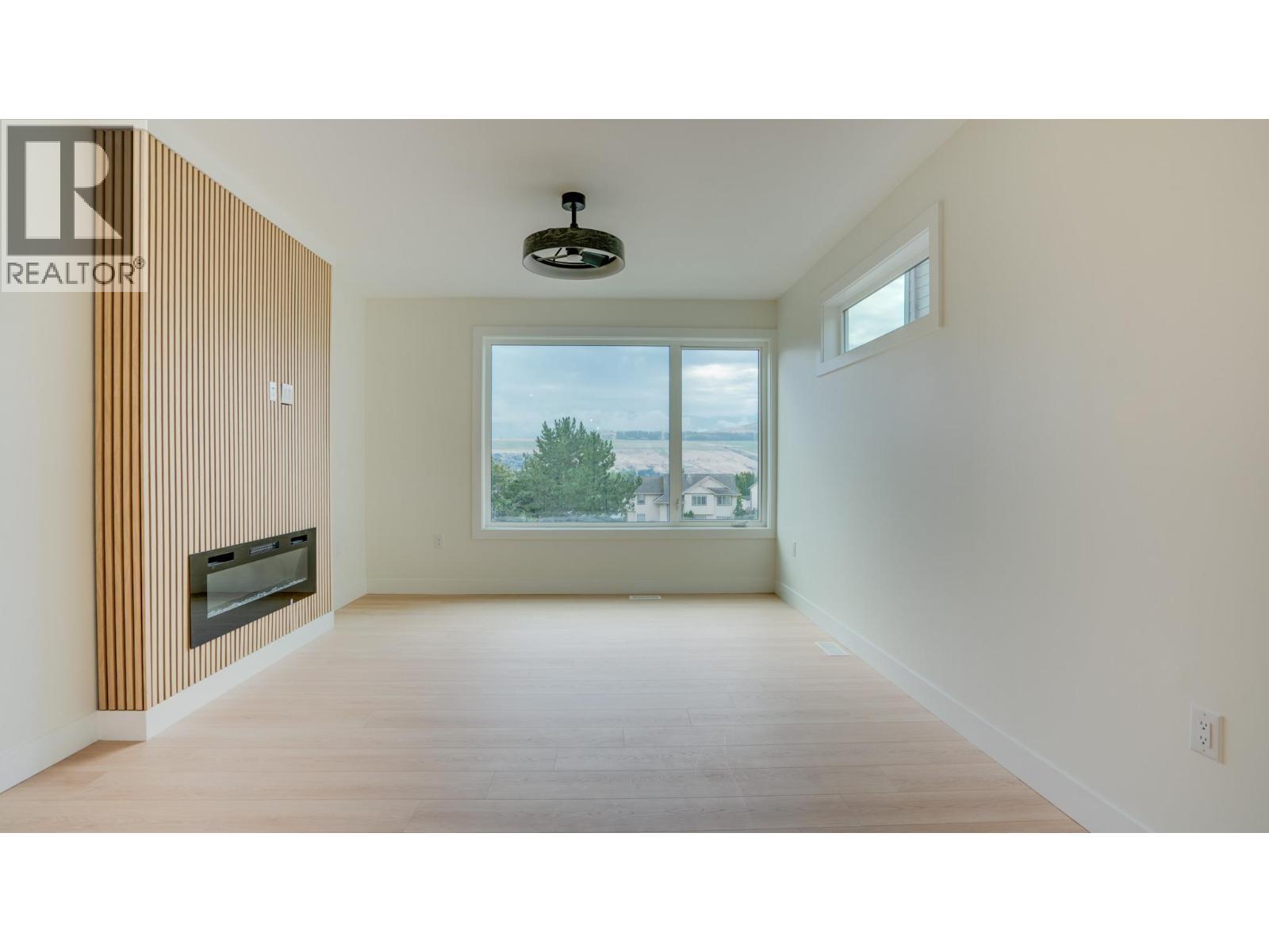 5705 Heritage Drive Unit# 5, Vernon, BC - Indoor With Fireplace