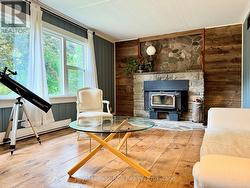 Large windows and barn-board feature wall. -