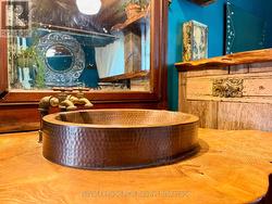 Copper hardware and sink. -