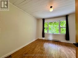 Hardwood flooring in both bedrooms. -