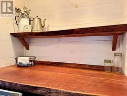 Including live-edge wood folding counter. -