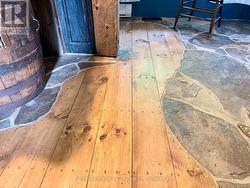 Unique natural wood & stone mix flooring used. -