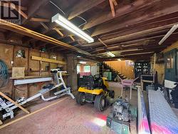 28ft x 32ft main level w/ concrete floor bay area. -