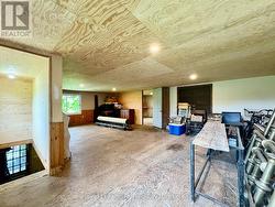 2nd level finished w/modern plywood & pot lights. -