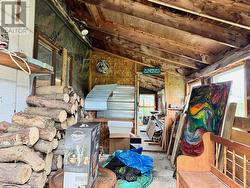 Side area storage-garden room. -