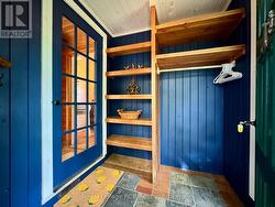 Enter the custom finish mud room with built-ins. -
