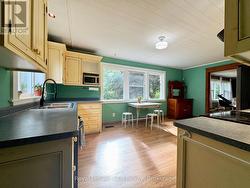 Open design kitchen-dining room. -