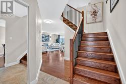 Beautiful oak staircase and upgraded railing. -