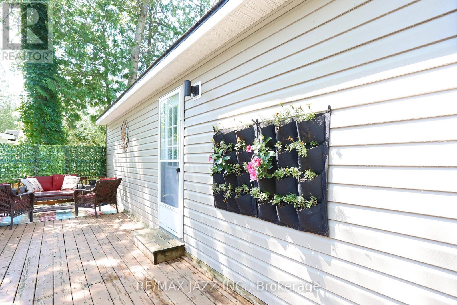 819 - 225 Platten Boulevard, Scugog, ON - Outdoor With Deck Patio Veranda With Exterior