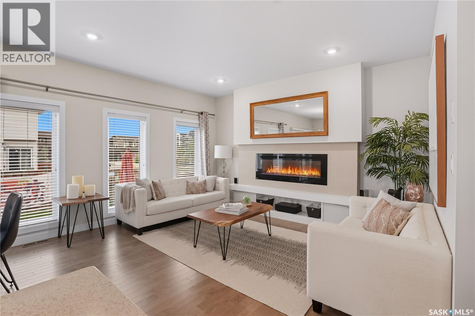 303 Dagnone Crescent, Saskatoon, SK - Indoor Photo Showing Living Room With Fireplace