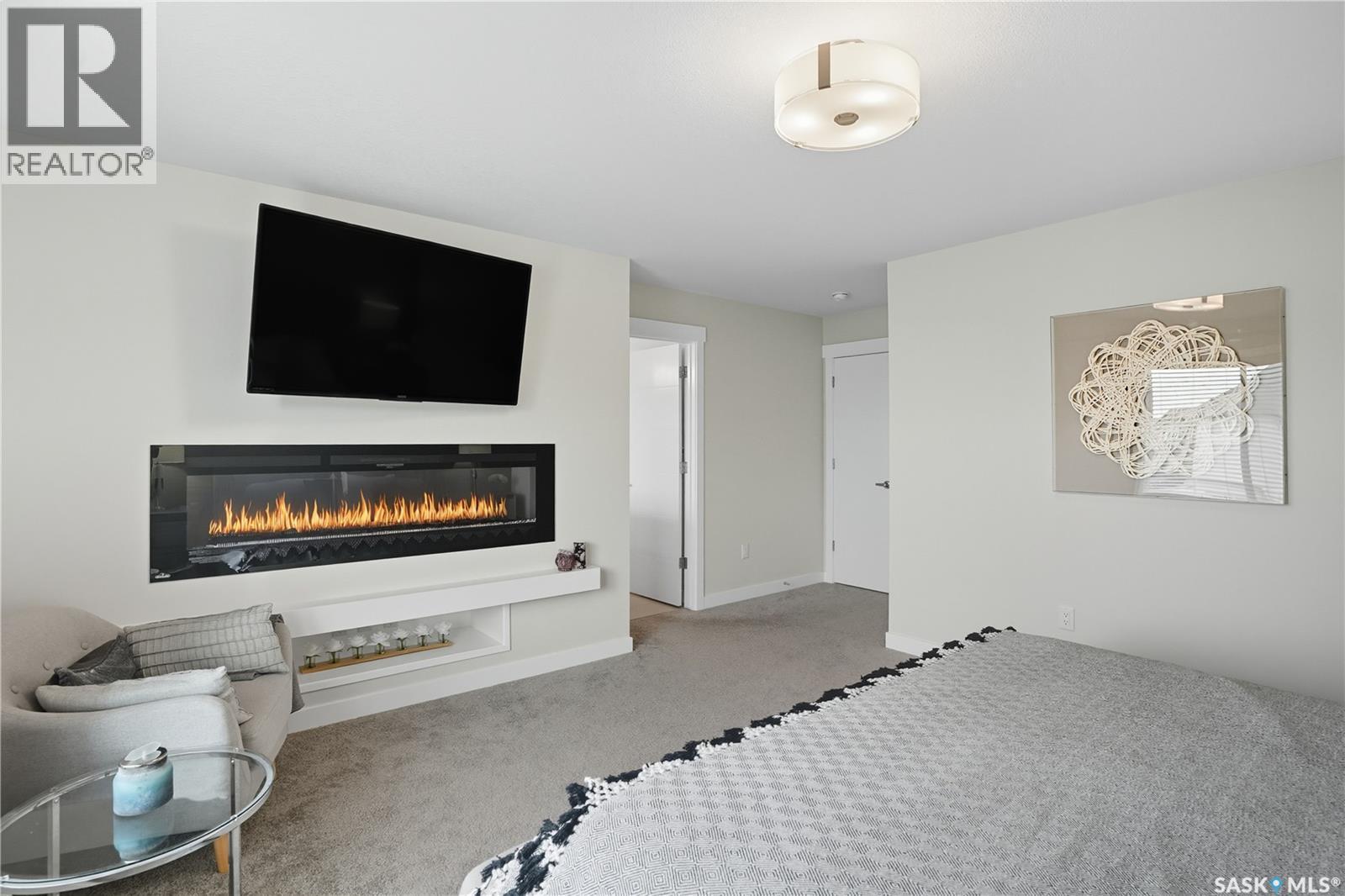 303 Dagnone Crescent, Saskatoon, SK - Indoor With Fireplace