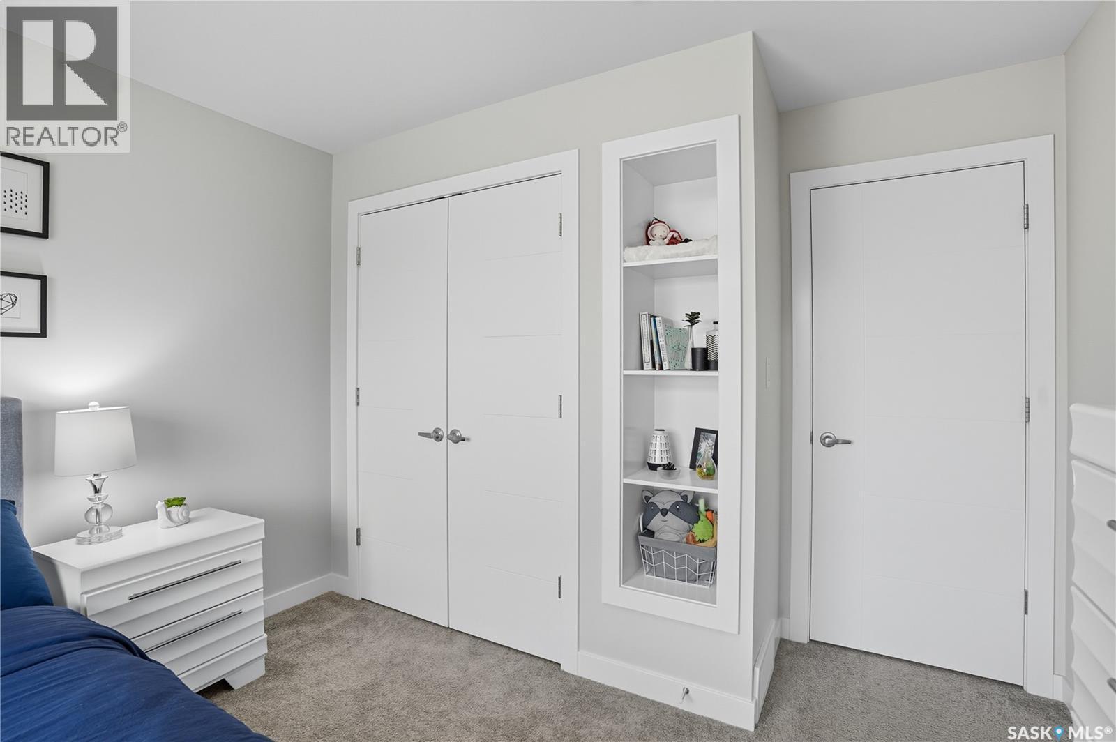 303 Dagnone Crescent, Saskatoon, SK - Indoor Photo Showing Bedroom