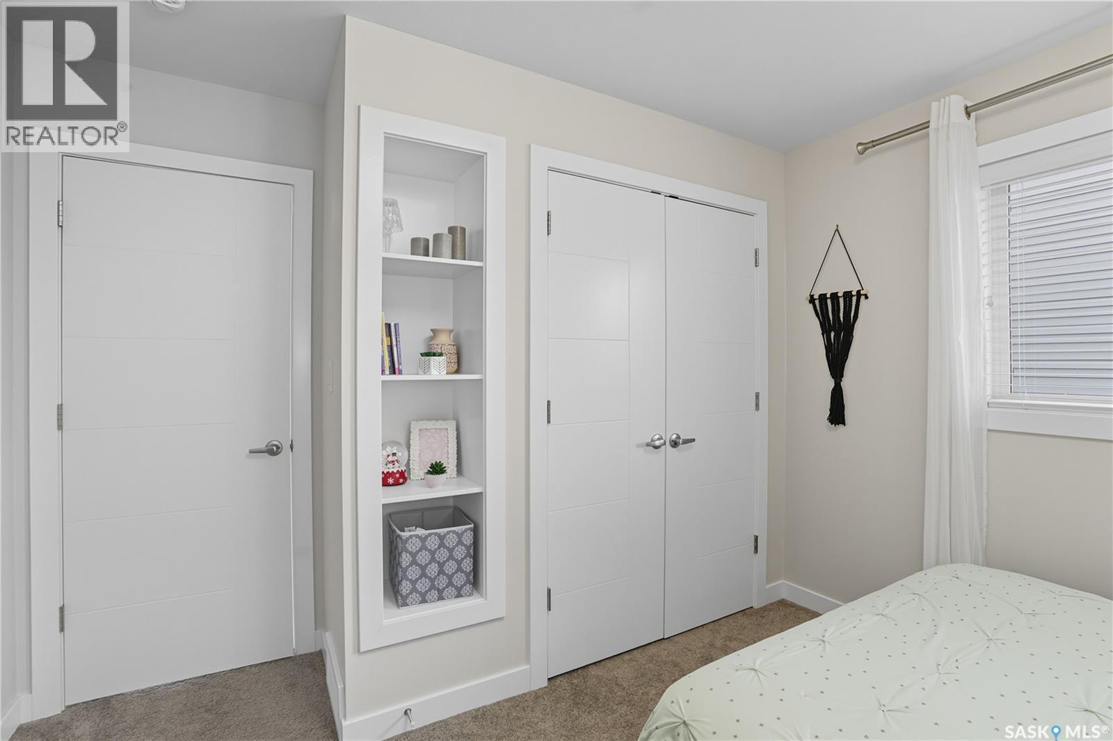 303 Dagnone Crescent, Saskatoon, SK - Indoor Photo Showing Bedroom