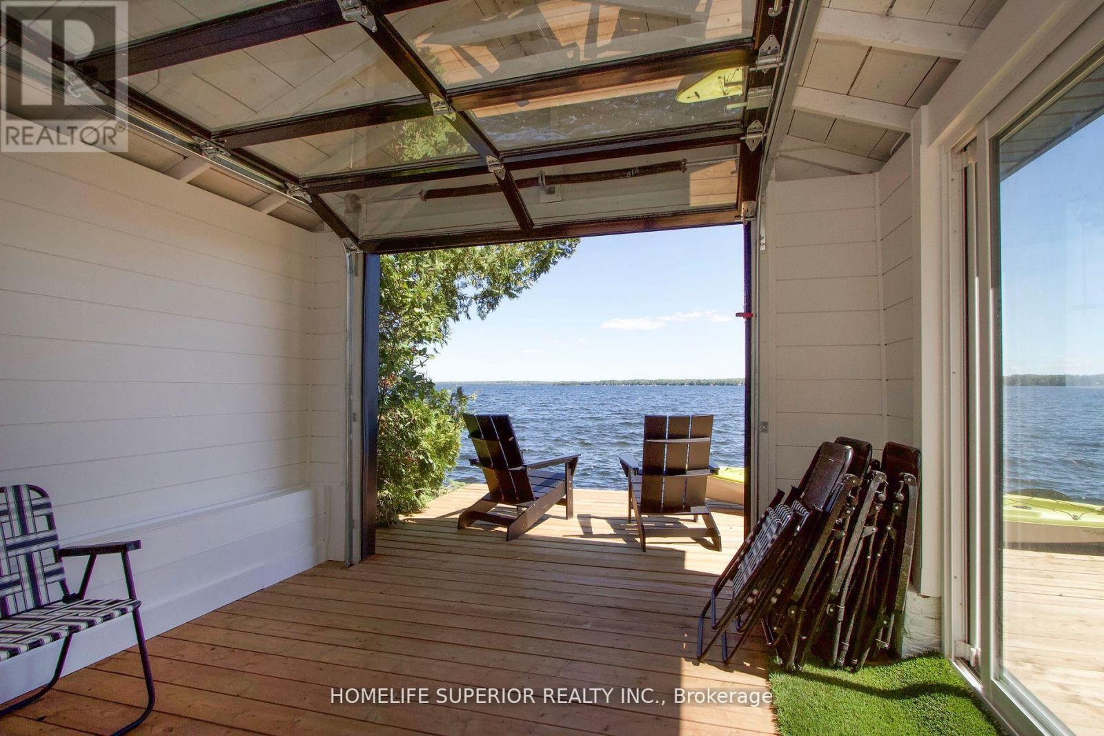 110 West Bay Boulevard, Kawartha Lakes (Bexley), ON - Outdoor With Body Of Water With Deck Patio Veranda With Exterior