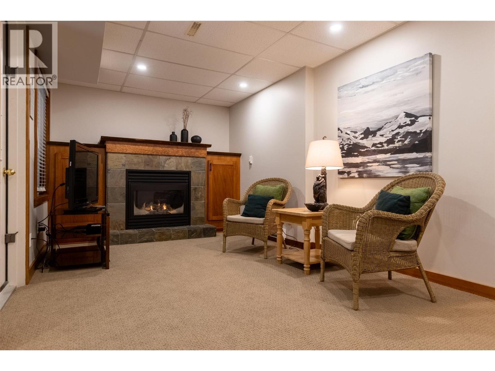4576 Timberline Crescent Unit# 4, Fernie, BC - Indoor With Fireplace