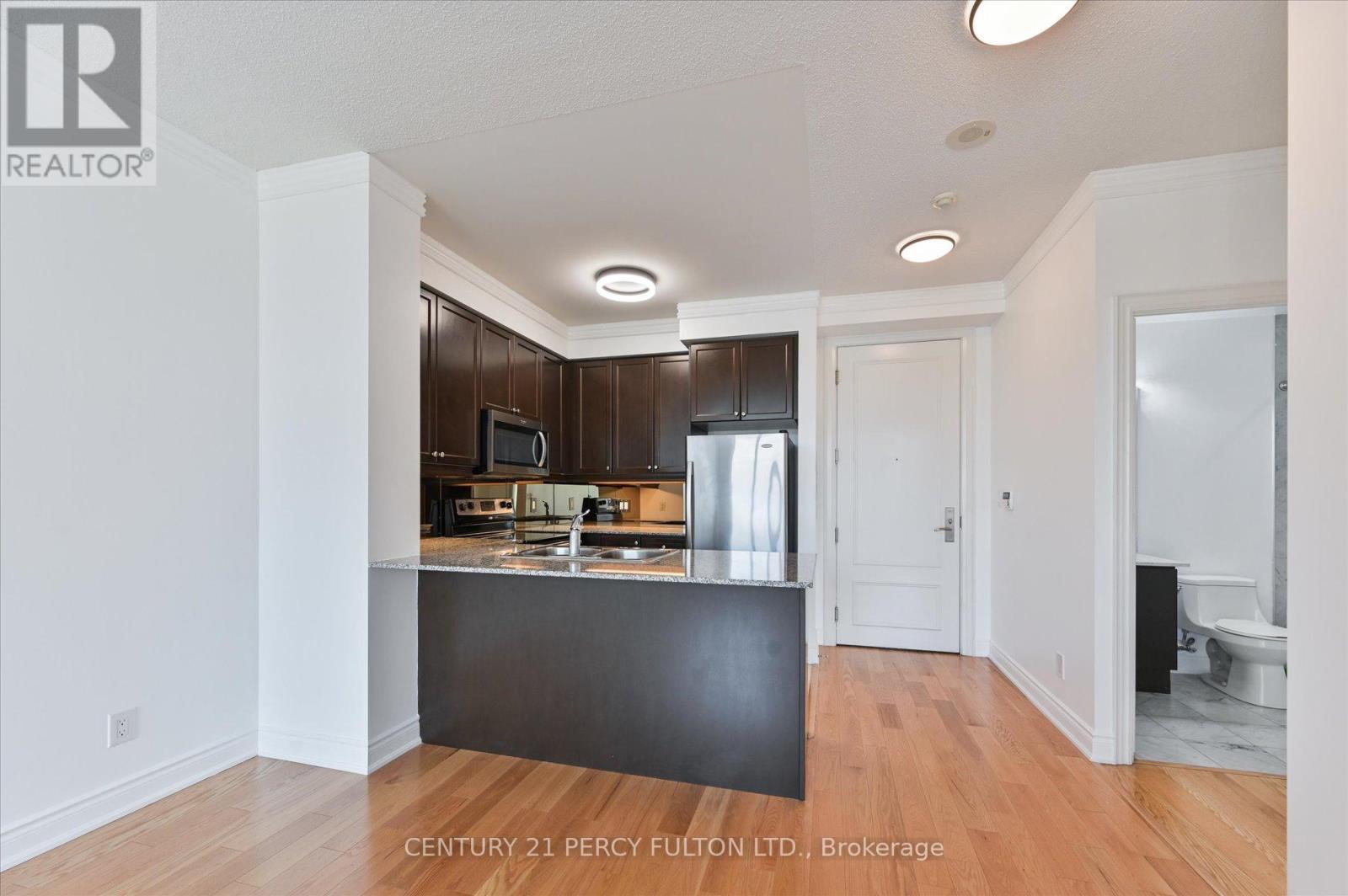 317 - 20 Bloorview Place, Toronto, ON - Indoor Photo Showing Kitchen
