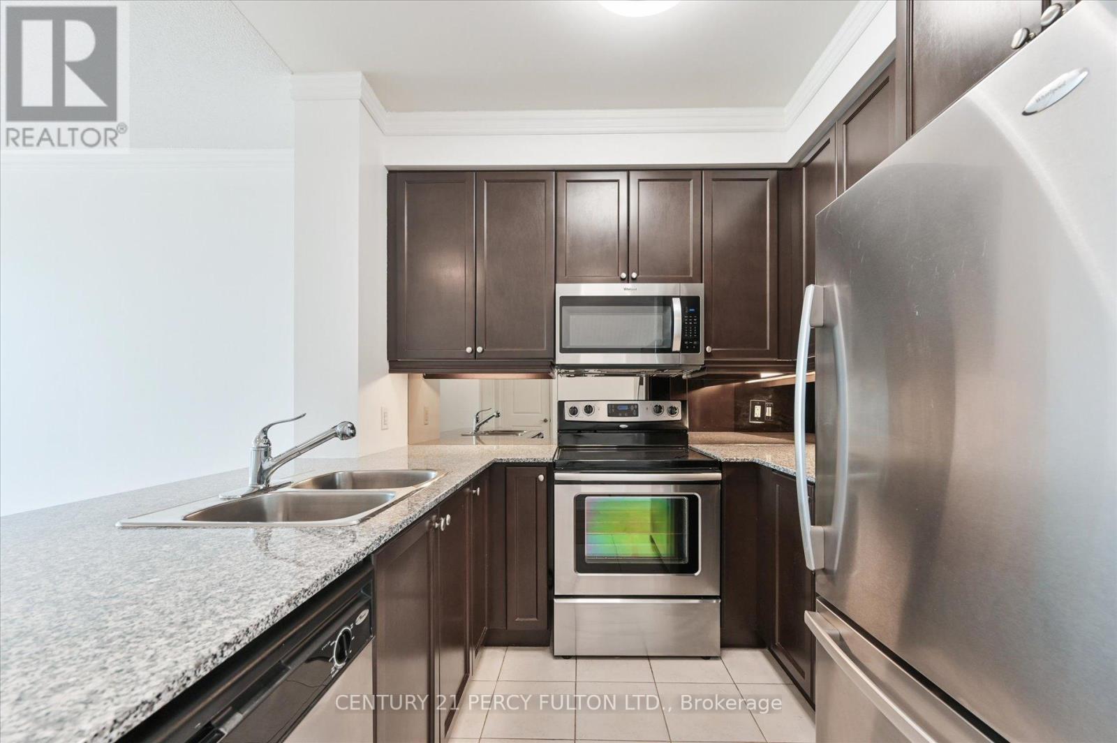 317 - 20 Bloorview Place, Toronto, ON - Indoor Photo Showing Kitchen With Double Sink