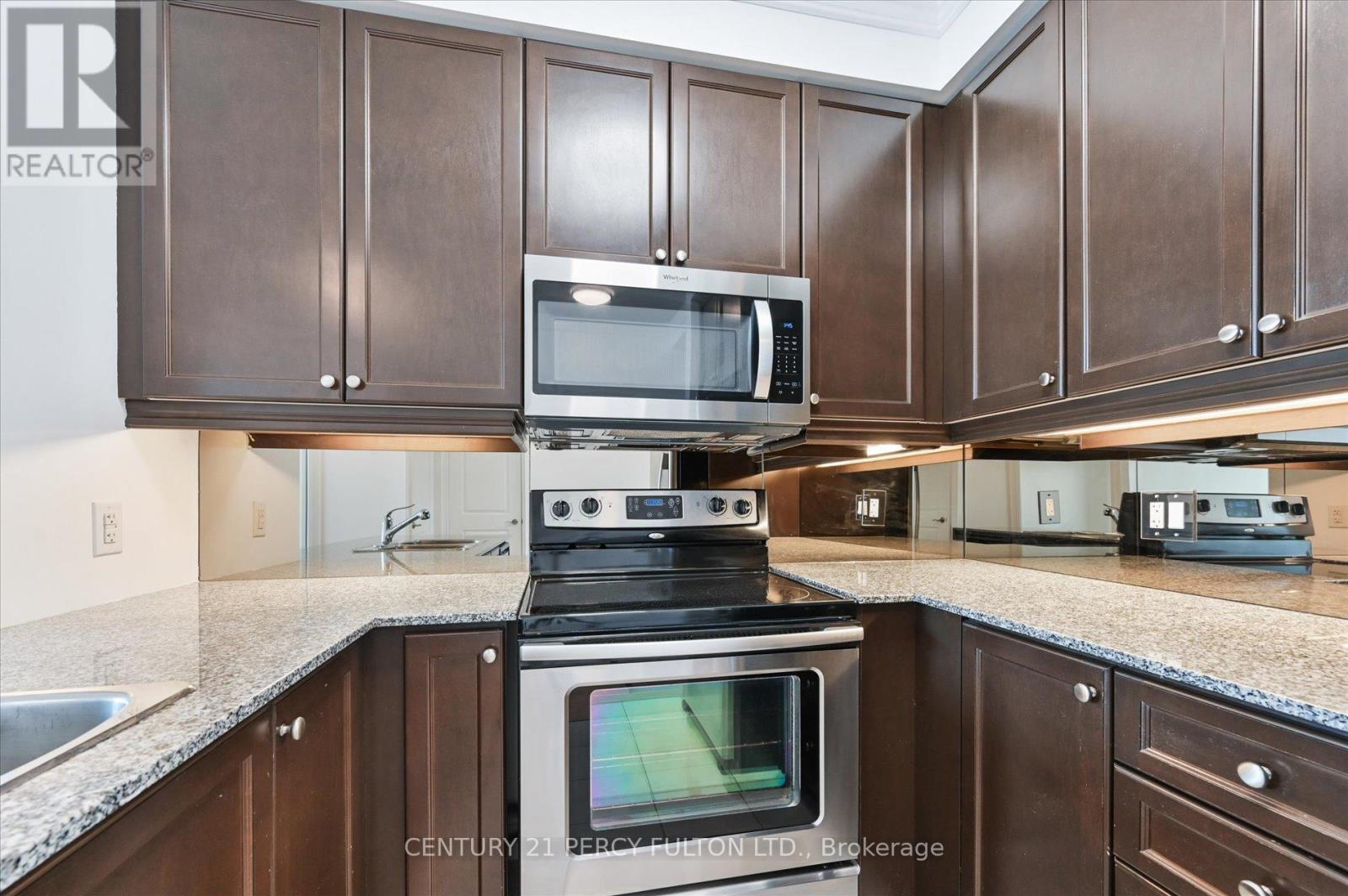 317 - 20 Bloorview Place, Toronto, ON - Indoor Photo Showing Kitchen With Upgraded Kitchen