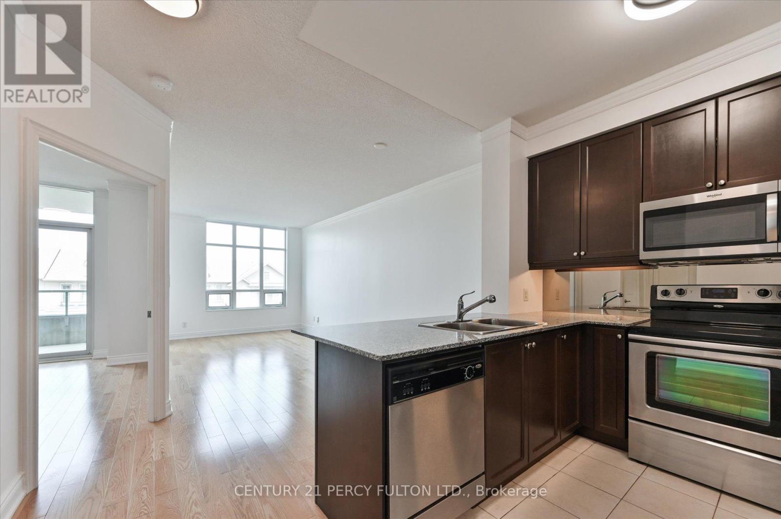 317 - 20 Bloorview Place, Toronto, ON - Indoor Photo Showing Kitchen With Double Sink